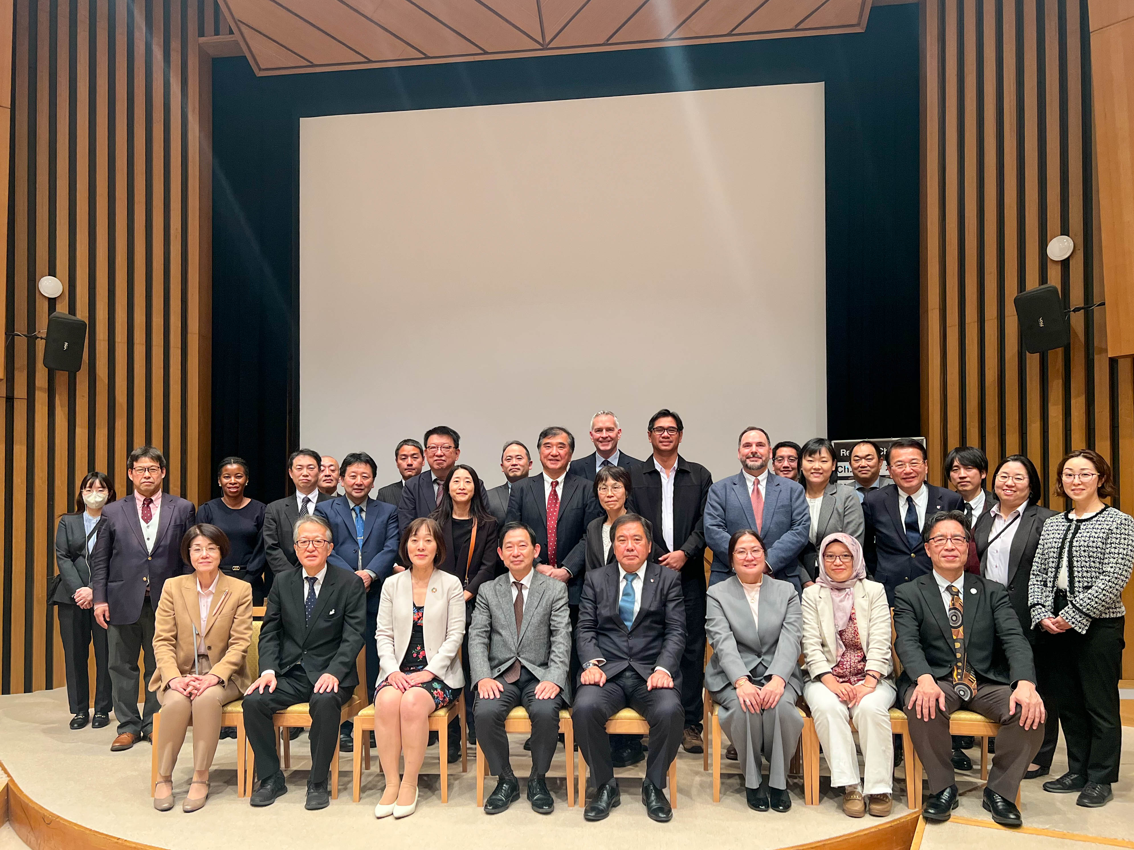 Group photo of speakers, SCJ members, and the Secretariat at the Academic Forum